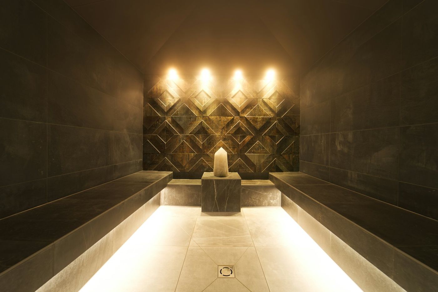 Steam room lit by a candle